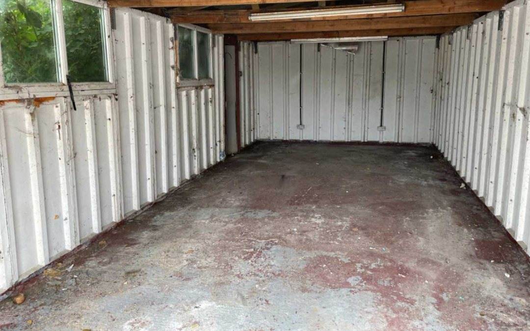 Empty garage after a full junk clearance