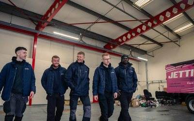 Jettison Express clearance crew walking through the depot