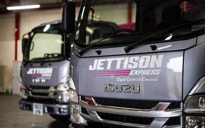 Two branded Jettison Express clearance trucks